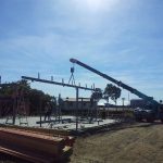Crane Lifting a Steel Post — Cranes in Mackay, QLD