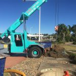 Crane Lifting a Rock — Cranes in Mackay, QLD