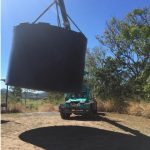 Crane Lifting a Tank — Cranes in Mackay, QLD