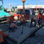 Crane Lifting a Cement Block — Cranes in Mackay, QLD